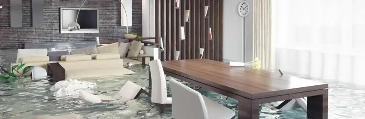 home interior affected by water damage with flooded floors and displaced furniture in Arlington, TX